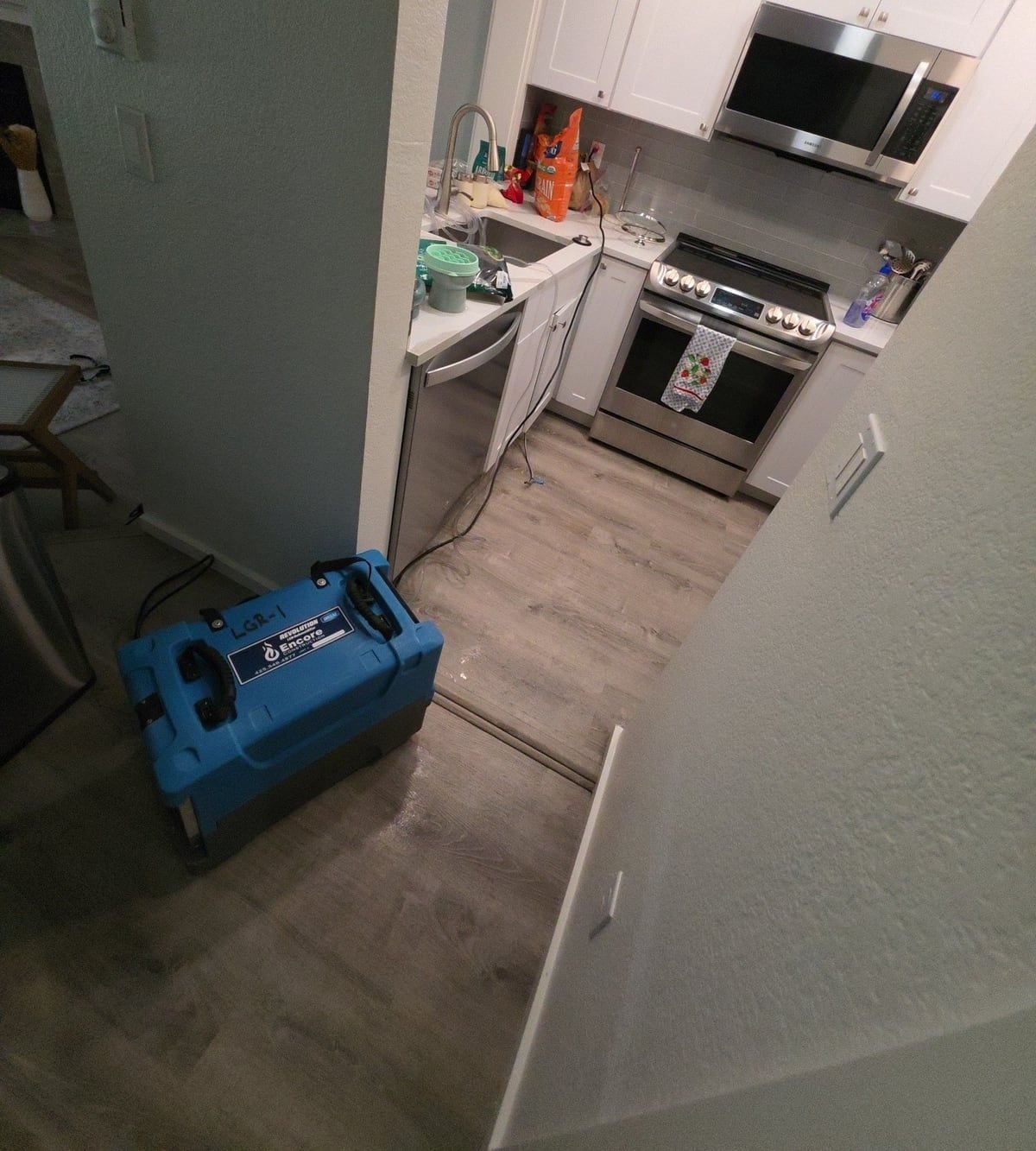 Encore drying equipment positioned beside the affected kitchen