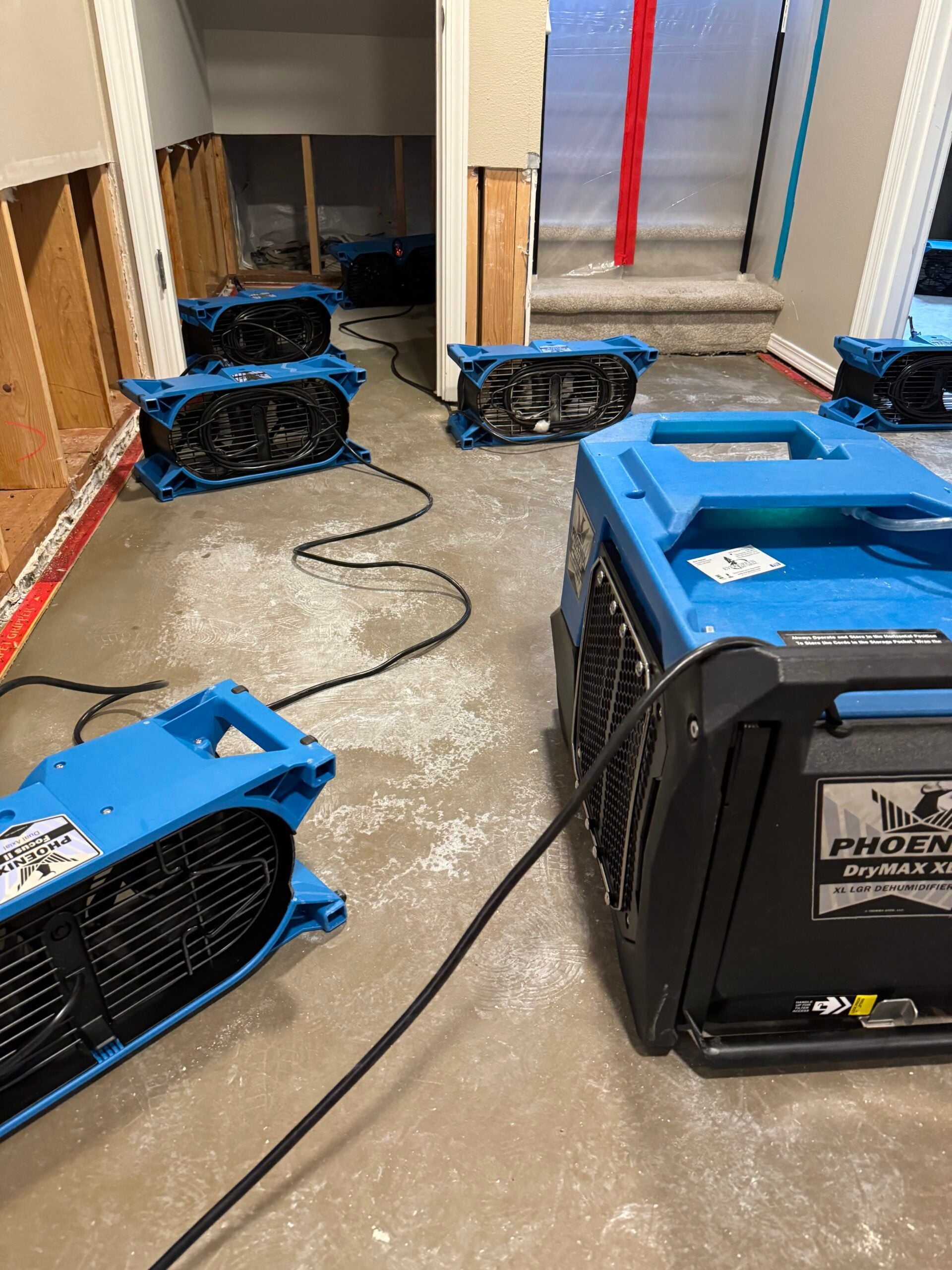 Structural drying equipment operating inside a home